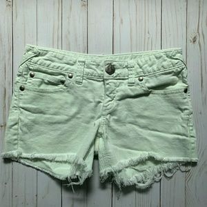 Free People mint green low rise cut off shorts